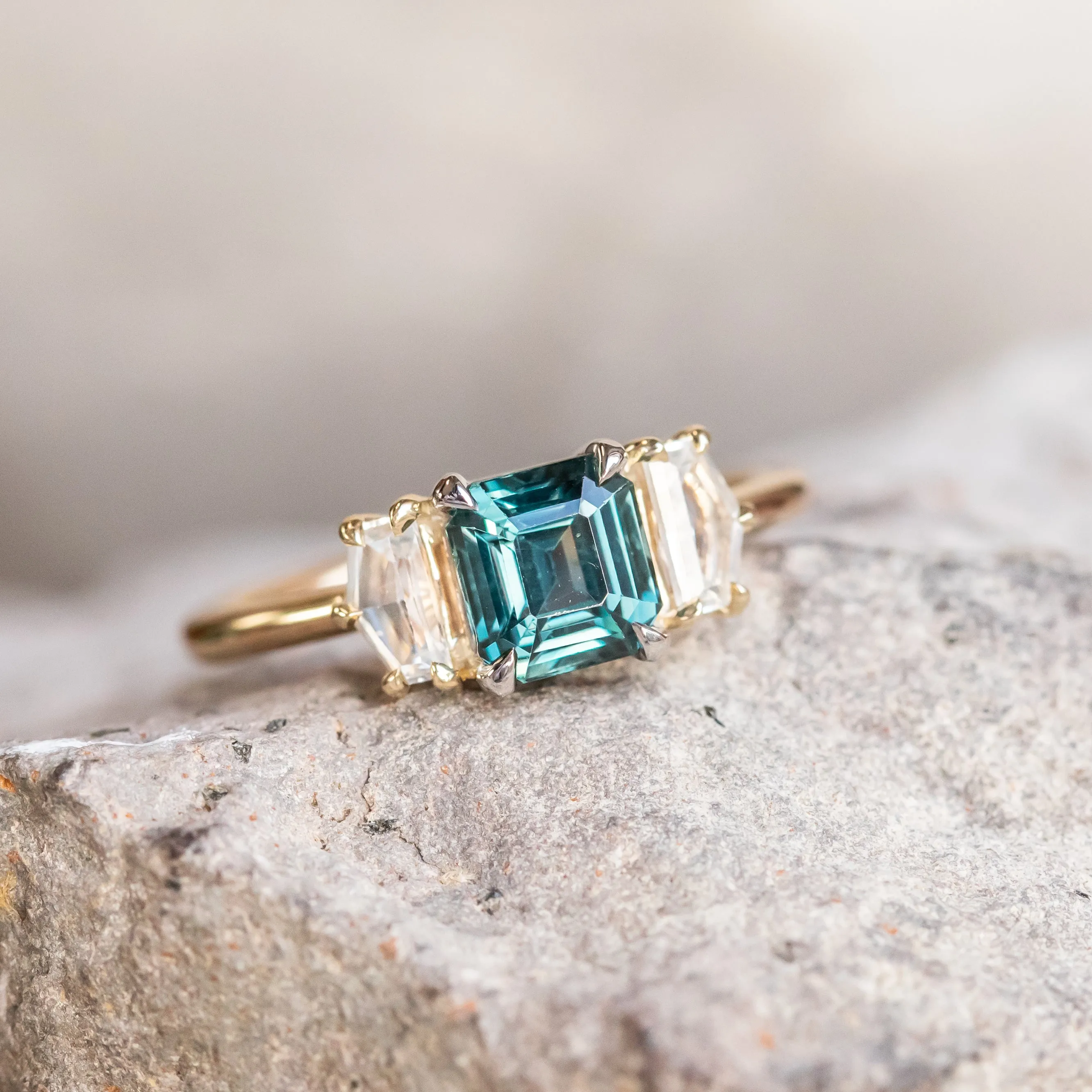 1.32ct Asscher Cut Color-Shifting Sapphire and White Sapphire Three Stone Ring in Platinum & 14k Yellow Gold