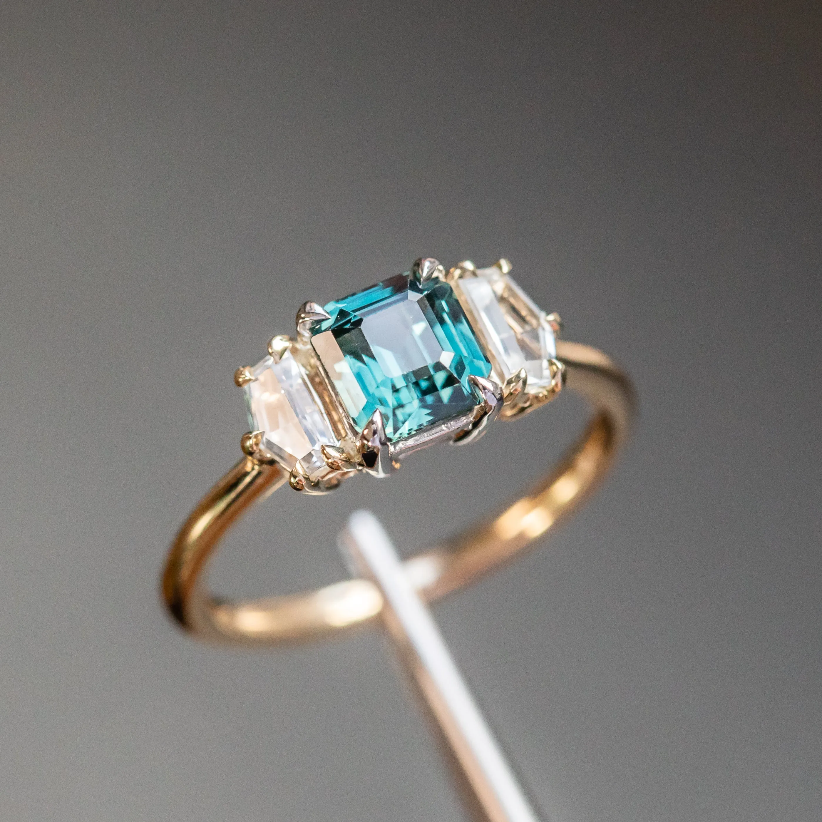 1.32ct Asscher Cut Color-Shifting Sapphire and White Sapphire Three Stone Ring in Platinum & 14k Yellow Gold