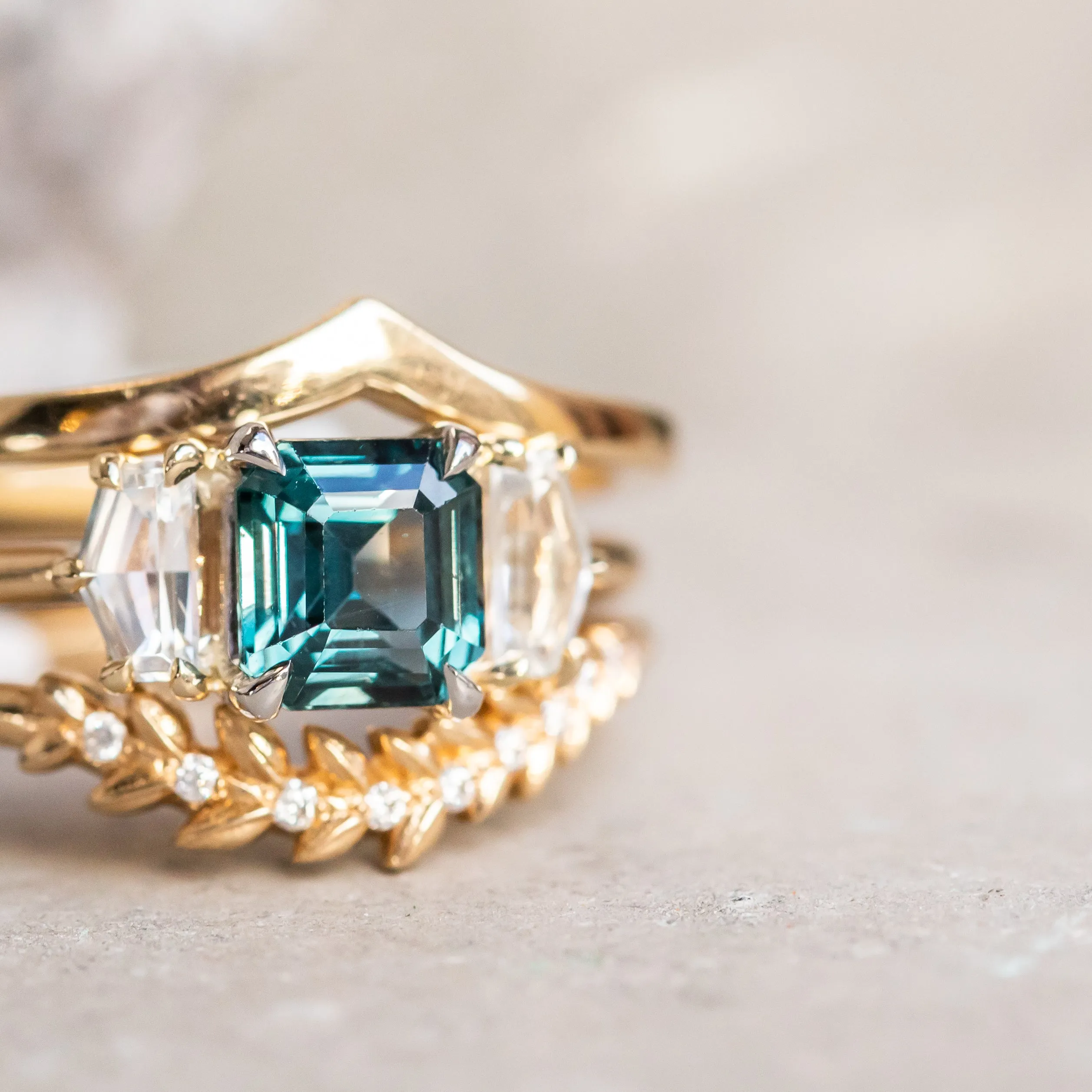1.32ct Asscher Cut Color-Shifting Sapphire and White Sapphire Three Stone Ring in Platinum & 14k Yellow Gold
