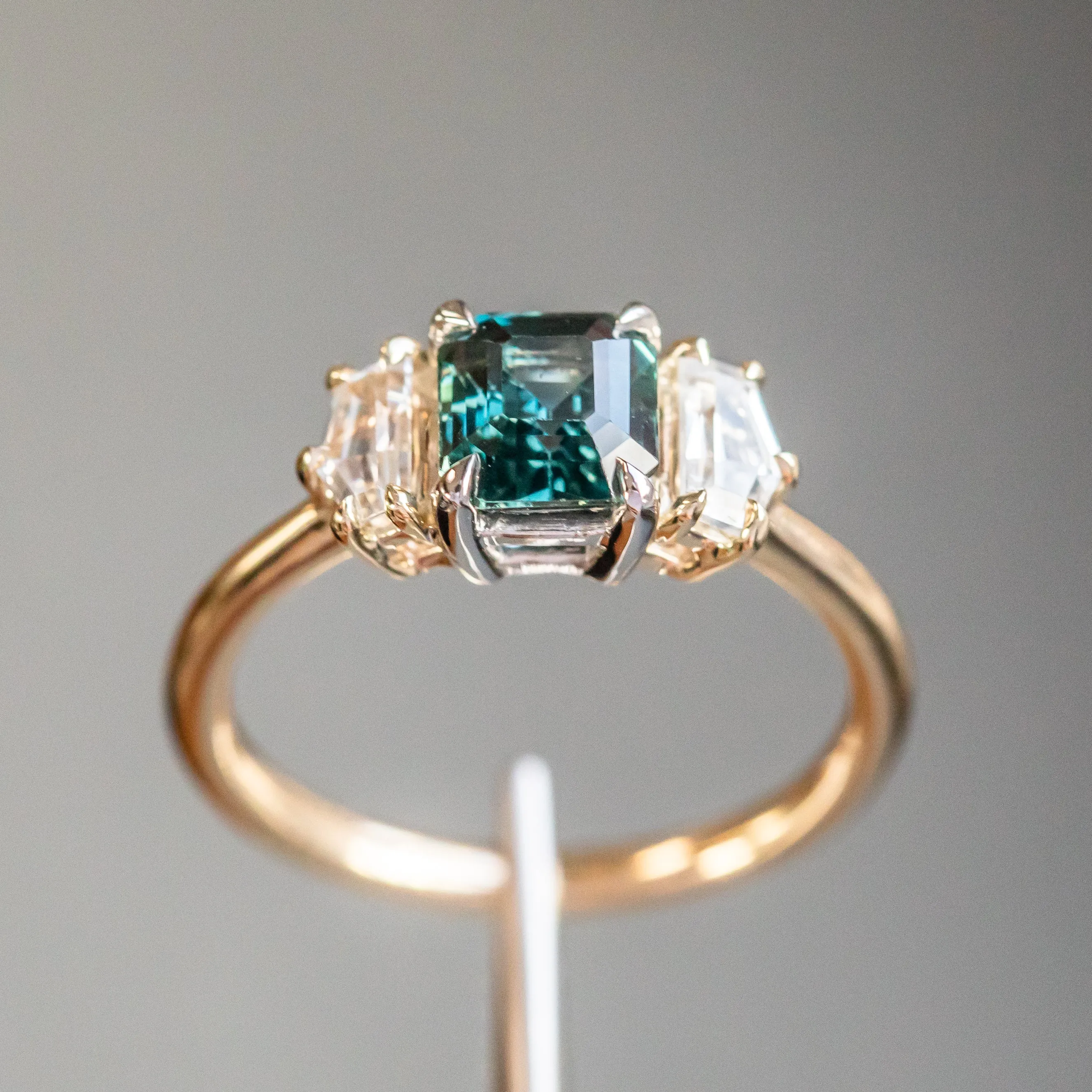 1.32ct Asscher Cut Color-Shifting Sapphire and White Sapphire Three Stone Ring in Platinum & 14k Yellow Gold