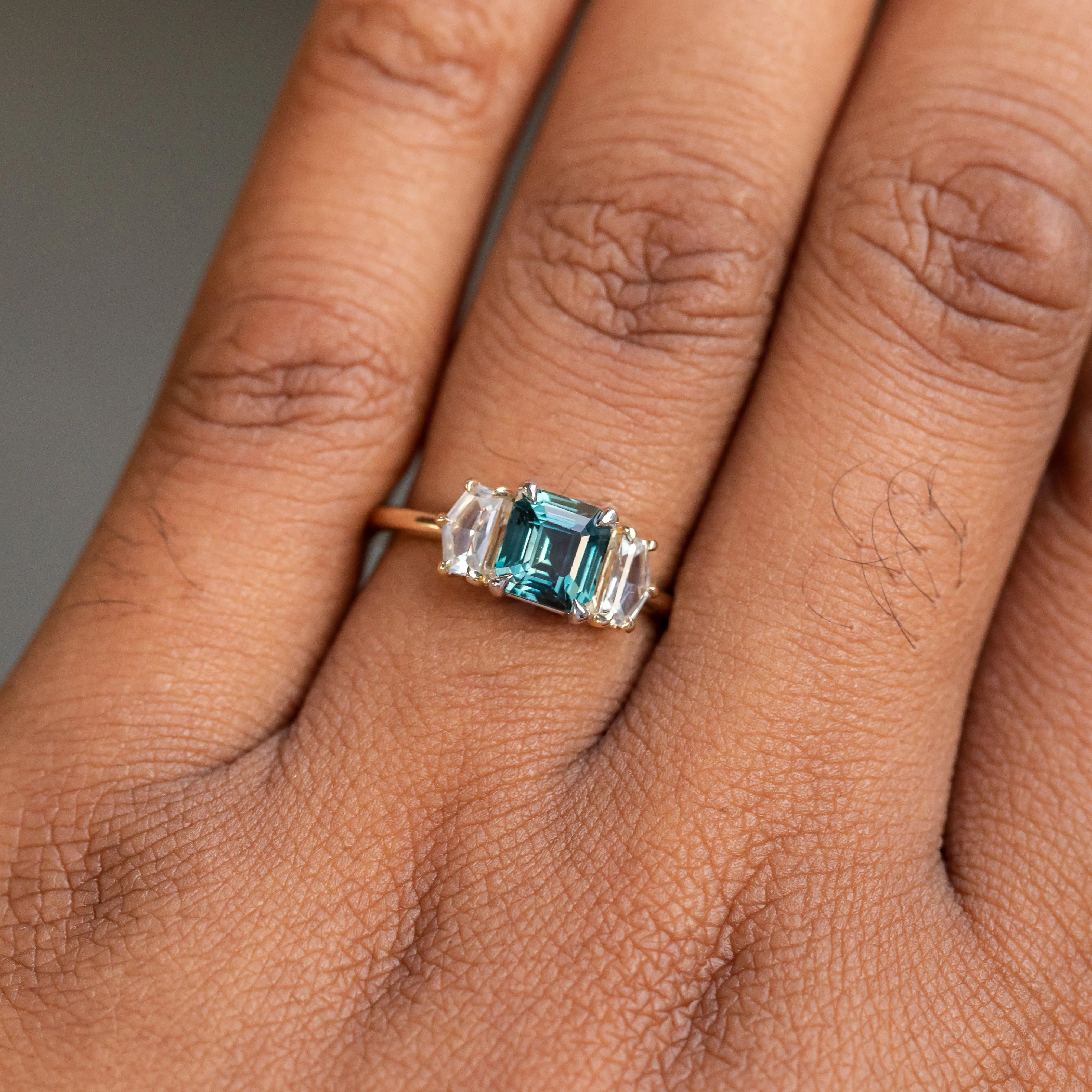 1.32ct Asscher Cut Color-Shifting Sapphire and White Sapphire Three Stone Ring in Platinum & 14k Yellow Gold