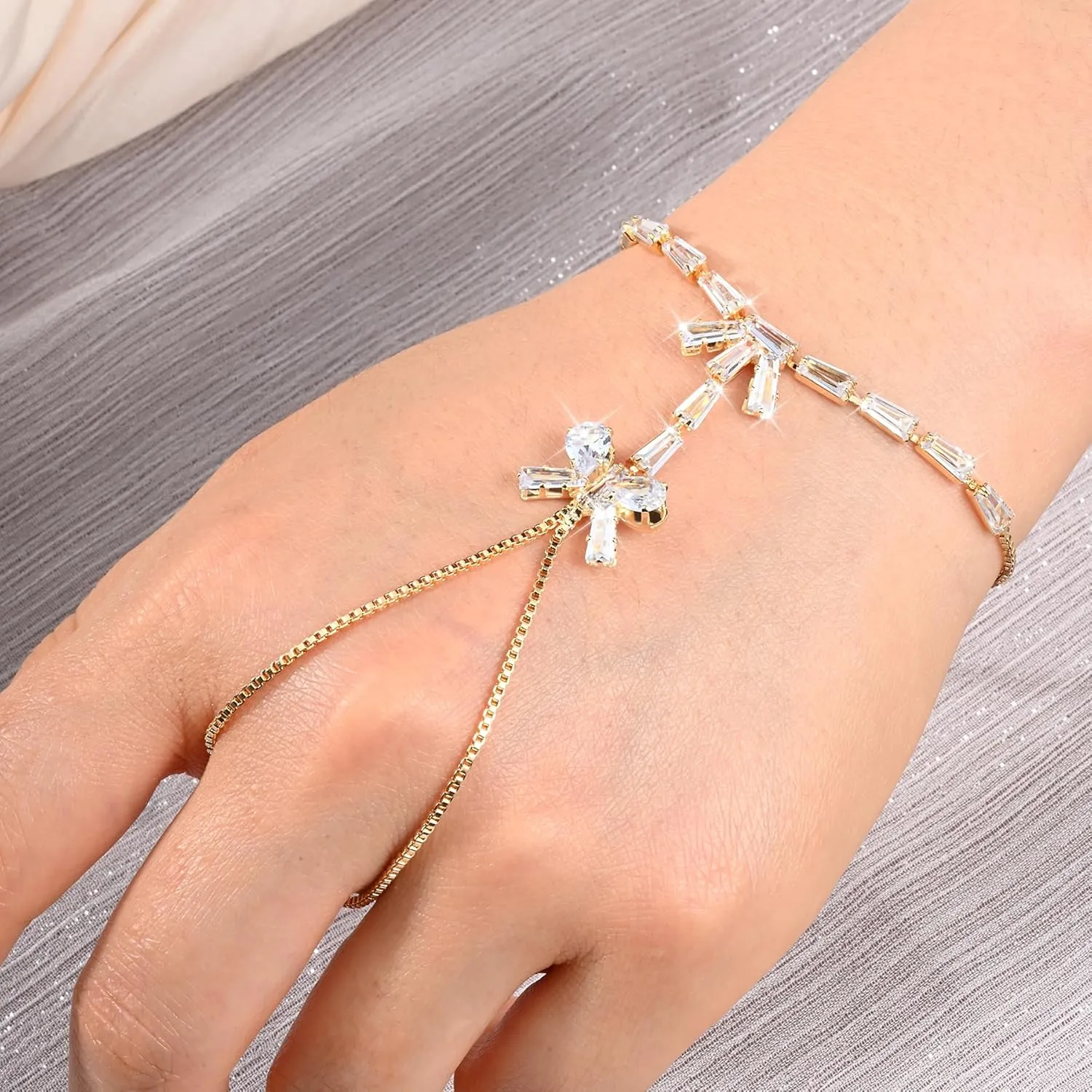 Adjustable Hand Chain Bracelet for Women,16K Hypoallergenic Finger Jewelry with Cubic Zirconia Butterfly Bow Charm,Secure Ball Clasp Customizable Fit for All Hand Sizes (Gold/Silver Tone)
